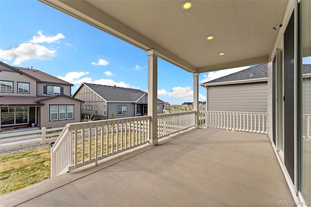 7051 S White Crow Way, Aurora, CO 80016 - view of patio with a residential view