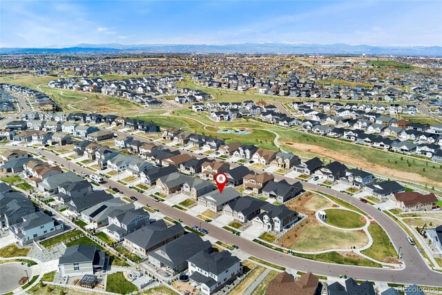 7051 S White Crow Way, Aurora, CO 80016 - view of property location with nearby suburban area and a mountainous background
