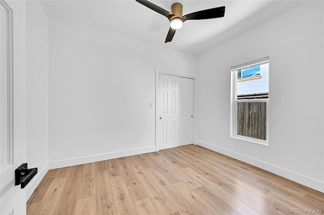 3064 S Galapago St, Englewood, CO 80110 - empty room featuring light wood-style flooring, baseboards, and a ceiling fan