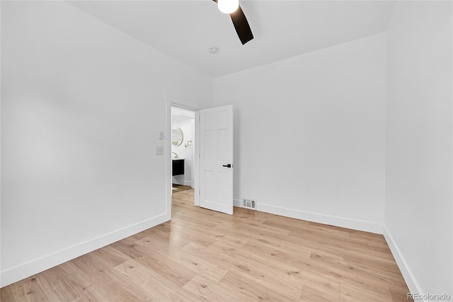 3064 S Galapago St, Englewood, CO 80110 - empty room with a ceiling fan, light wood finished floors, and baseboards