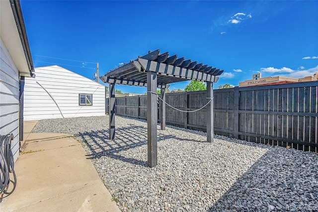 3064 S Galapago St, Englewood, CO 80110 - fenced backyard featuring a pergola and a patio