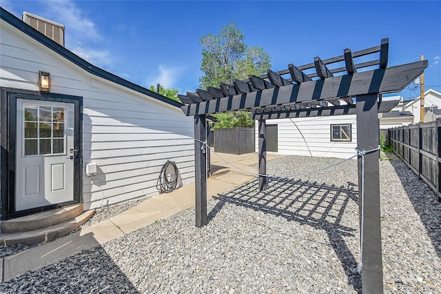3064 S Galapago St, Englewood, CO 80110 - fenced backyard with a patio, a pergola, and entry steps