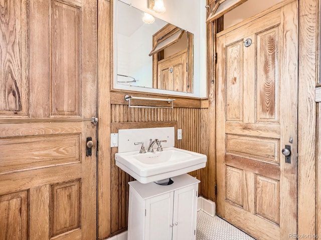 1453 Vine St, Denver, CO 80206 - bathroom with vanity and wooden walls