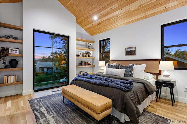 2378 S Bannock St, Denver, CO 80223 - bedroom with wood ceiling, wood finished floors, high vaulted ceiling, and access to exterior