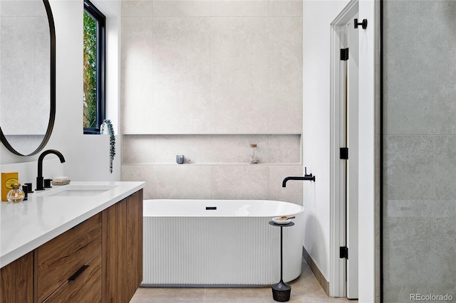 2378 S Bannock St, Denver, CO 80223 - bathroom with vanity and a soaking tub