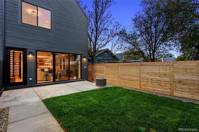 2378 S Bannock St, Denver, CO 80223 - fenced backyard featuring a patio area