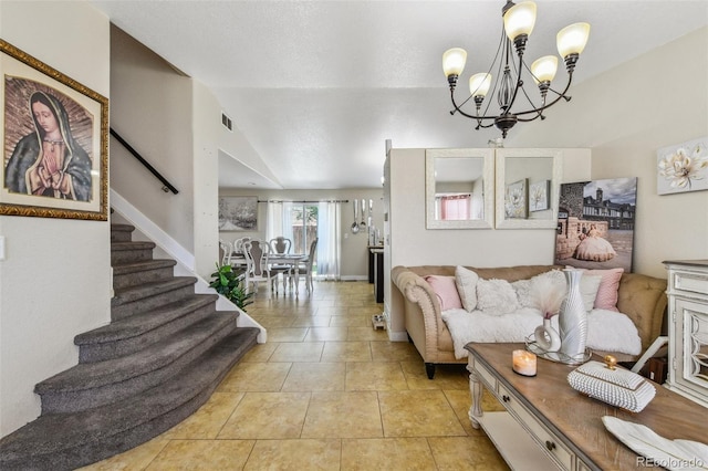 20651 E 42nd Ave, Denver, CO 80249 - living area with stairway, a chandelier, and lofted ceiling