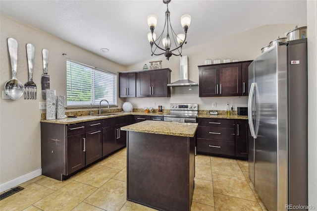 20651 E 42nd Ave, Denver, CO 80249 - kitchen featuring appliances with stainless steel finishes, wall chimney range hood, a chandelier, a kitchen island, and light stone counters