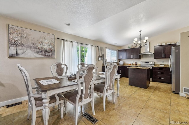 20651 E 42nd Ave, Denver, CO 80249 - dining space featuring a chandelier, lofted ceiling, light tile patterned floors, and a textured ceiling
