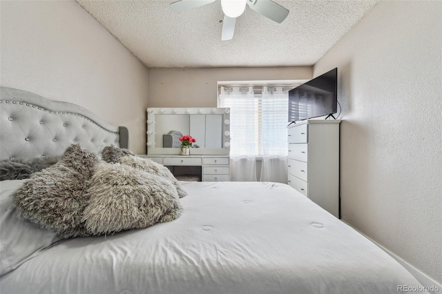 20651 E 42nd Ave, Denver, CO 80249 - bedroom featuring a textured ceiling and a ceiling fan