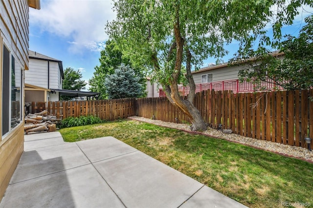 20651 E 42nd Ave, Denver, CO 80249 - fenced backyard with a patio