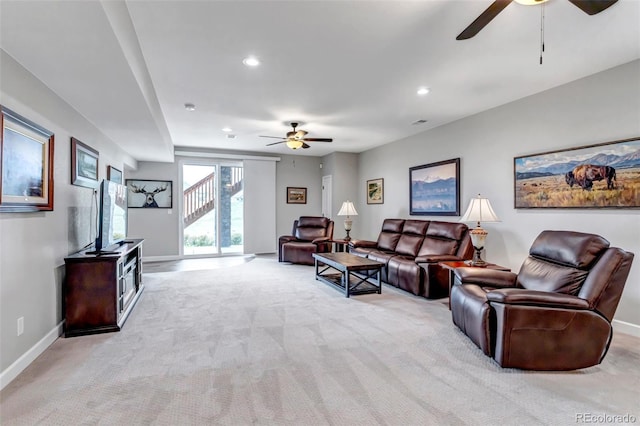9055 Swan River St, Littleton, CO 80125 - living area with ceiling fan, recessed lighting, and light carpet