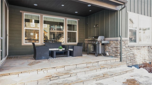 view of patio / terrace with an outdoor living space and area for grilling