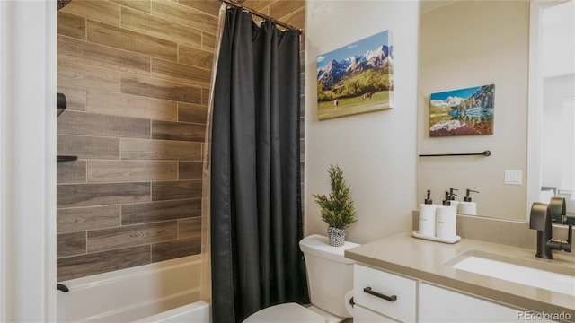 full bathroom featuring vanity, toilet, and shower / tub combo