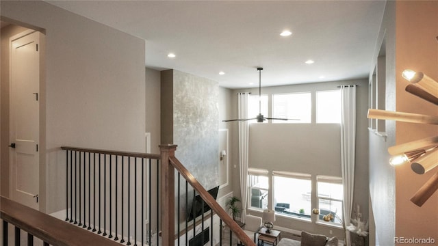 staircase featuring a wealth of natural light