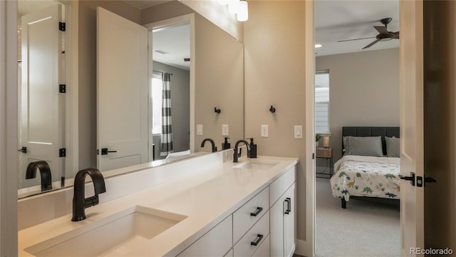 bathroom with ceiling fan and vanity