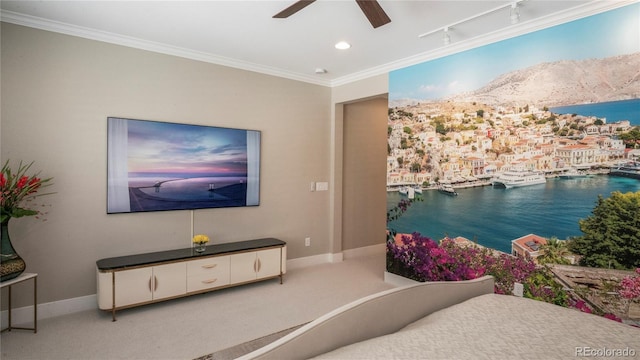 bedroom featuring a water view, light colored carpet, ornamental molding, and rail lighting