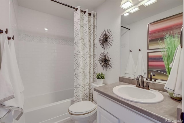 full bath featuring shower / tub combo, vanity, and toilet