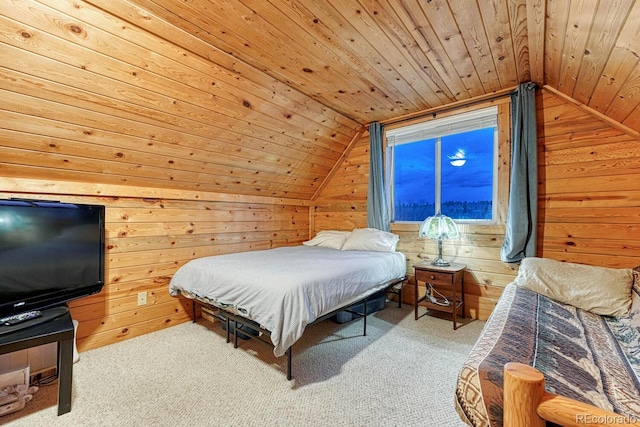 carpeted bedroom with lofted ceiling, wood walls, and wooden ceiling