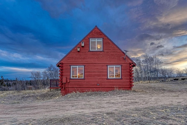 view of home's exterior featuring log siding