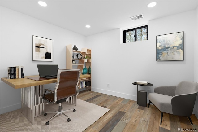 office area featuring baseboards, wood finished floors, and recessed lighting