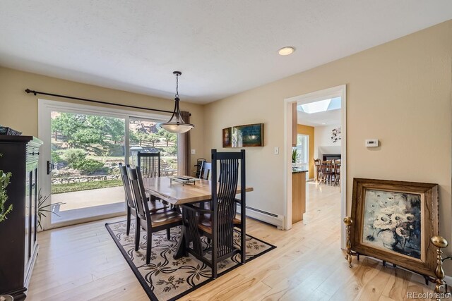 6227 Colorow Dr, Morrison, CO 80465 - dining space with light wood-style floors