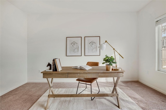 office area with carpet flooring and baseboards