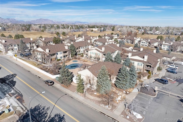 bird's eye view with a residential view and a mountain view