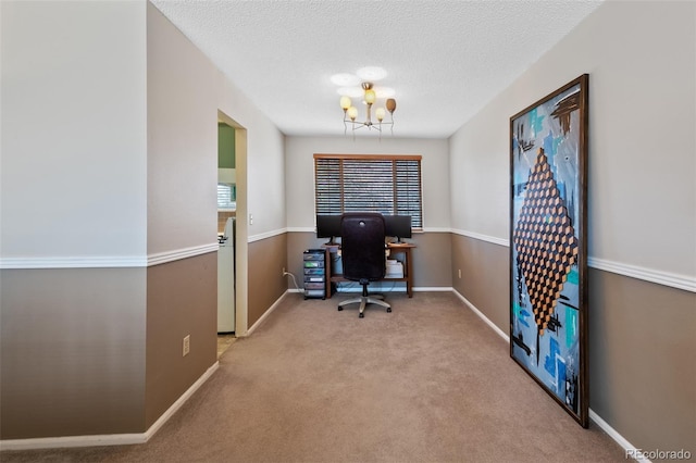 office area with light carpet, a chandelier, and a textured ceiling