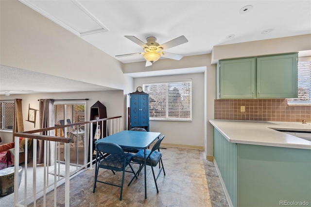 dining space featuring ceiling fan