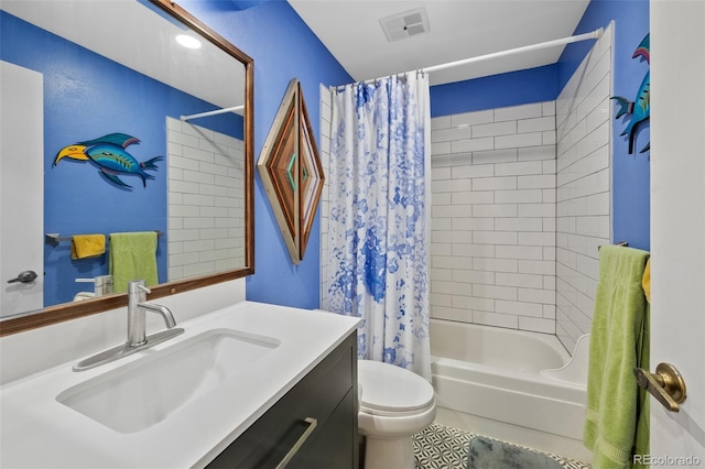 full bathroom featuring vanity, toilet, and shower / bath combo with shower curtain