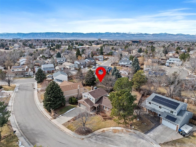 drone / aerial view featuring a mountain view