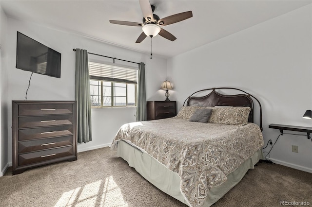 bedroom with baseboards, carpet, and ceiling fan