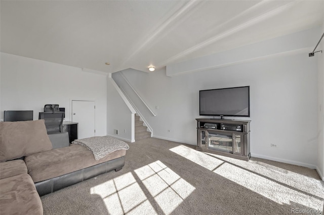 living area with stairway, baseboards, and carpet floors