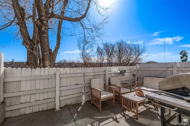 view of patio featuring a fenced backyard