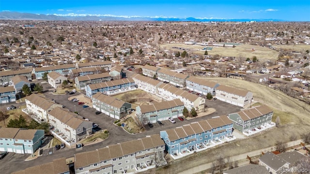 drone / aerial view with a residential view and a mountain view