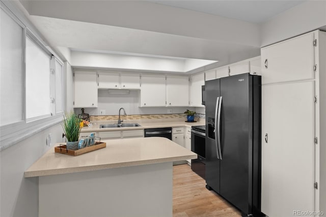 4262 E Maplewood Way, Centennial, CO 80121 - kitchen featuring appliances with stainless steel finishes, a sink, light countertops, and white cabinetry