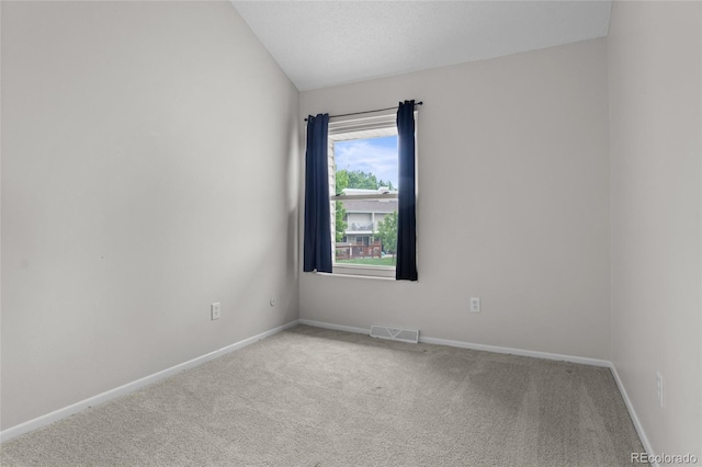 4262 E Maplewood Way, Centennial, CO 80121 - carpeted spare room featuring baseboards and lofted ceiling