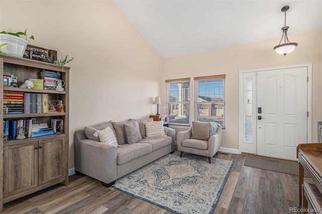 living room with dark wood-type flooring and lofted ceiling