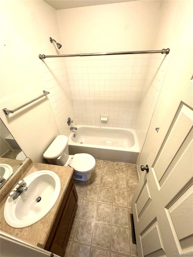 55619 E 31st Ave, Strasburg, CO 80136 - bathroom featuring vanity and bathing tub / shower combination