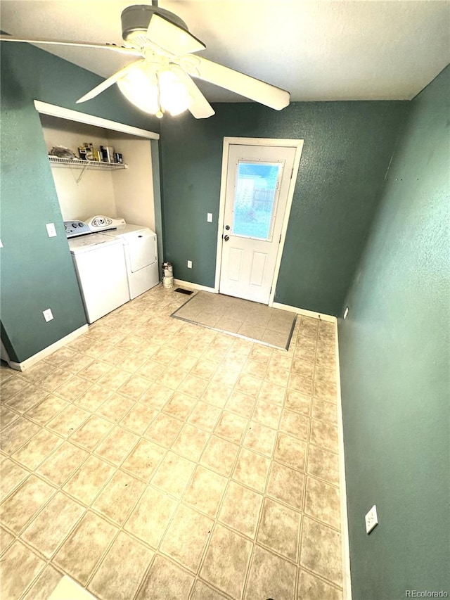 55619 E 31st Ave, Strasburg, CO 80136 - laundry room with washing machine and clothes dryer, a ceiling fan, and light tile patterned flooring