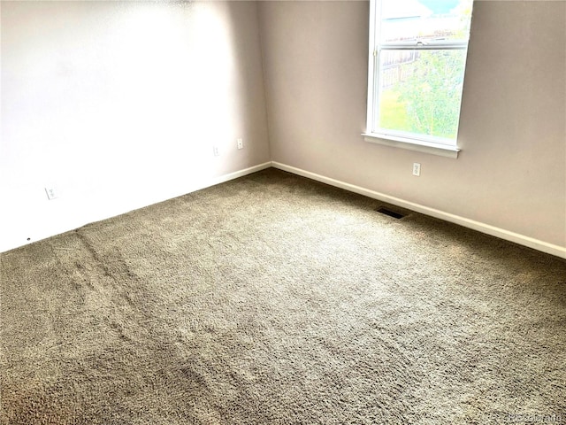 55619 E 31st Ave, Strasburg, CO 80136 - unfurnished room featuring carpet floors and baseboards