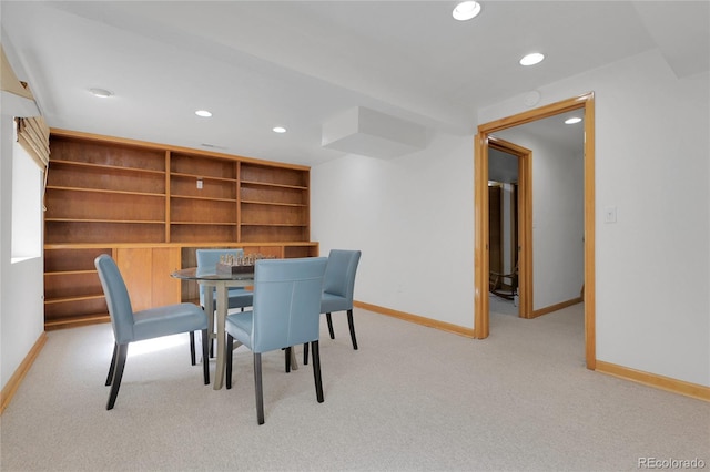 carpeted dining area featuring baseboards and recessed lighting