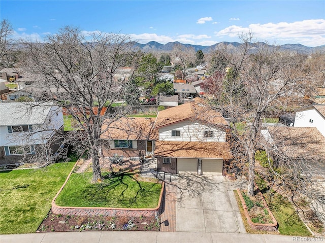 bird's eye view with a mountain view and a residential view