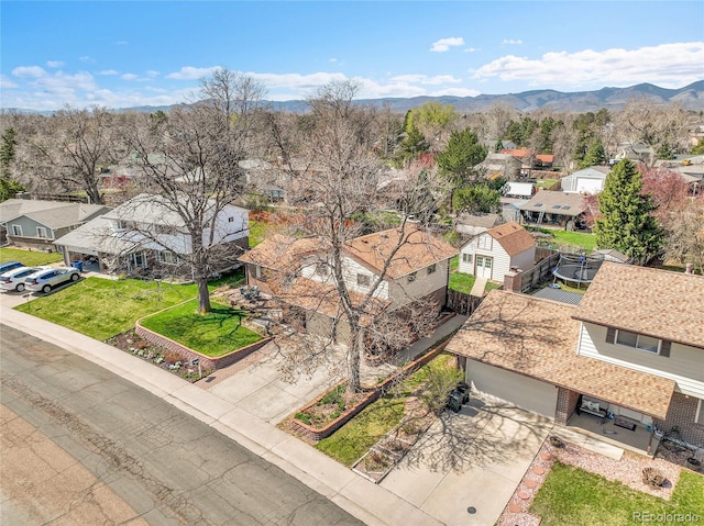 aerial view with a mountain view and a residential view