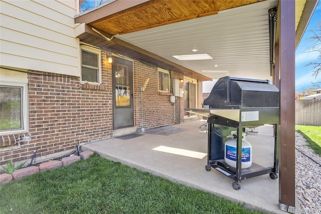 4381 S Estes St, Littleton, CO 80123 - view of patio featuring fence and area for grilling