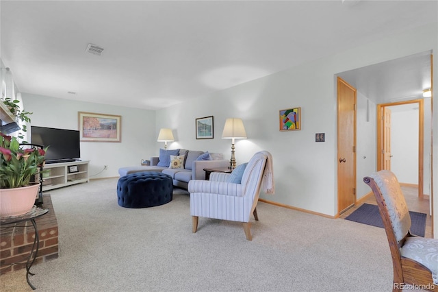 4381 S Estes St, Littleton, CO 80123 - carpeted living room featuring baseboards