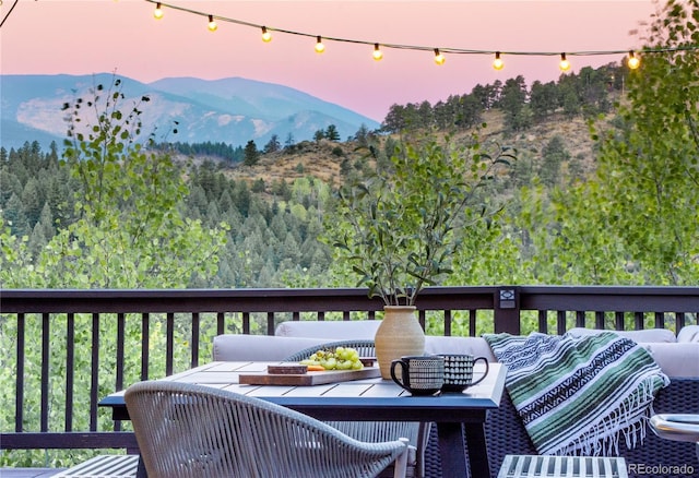 288 Spring Vly, Bailey, CO 80421 - wooden terrace featuring an outdoor hangout area and a mountain view