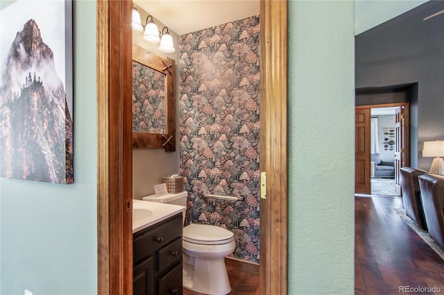 288 Spring Vly, Bailey, CO 80421 - half bath featuring vanity and wood finished floors