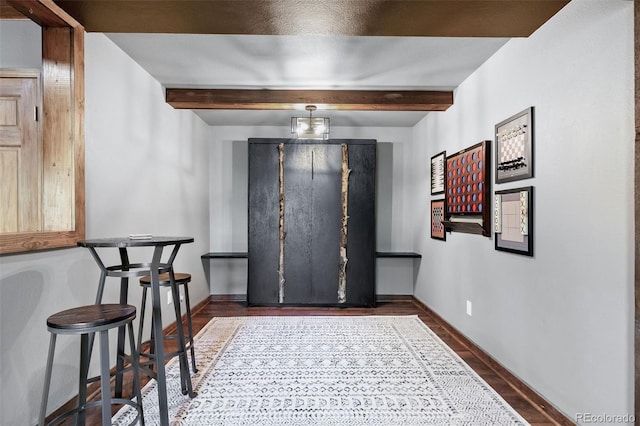 288 Spring Vly, Bailey, CO 80421 - entryway featuring beam ceiling and wood finished floors